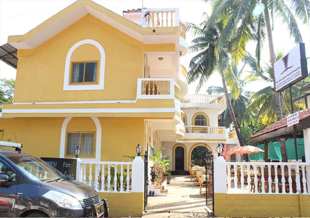 Time & Leisure Hotels Candolim Bagian luar foto